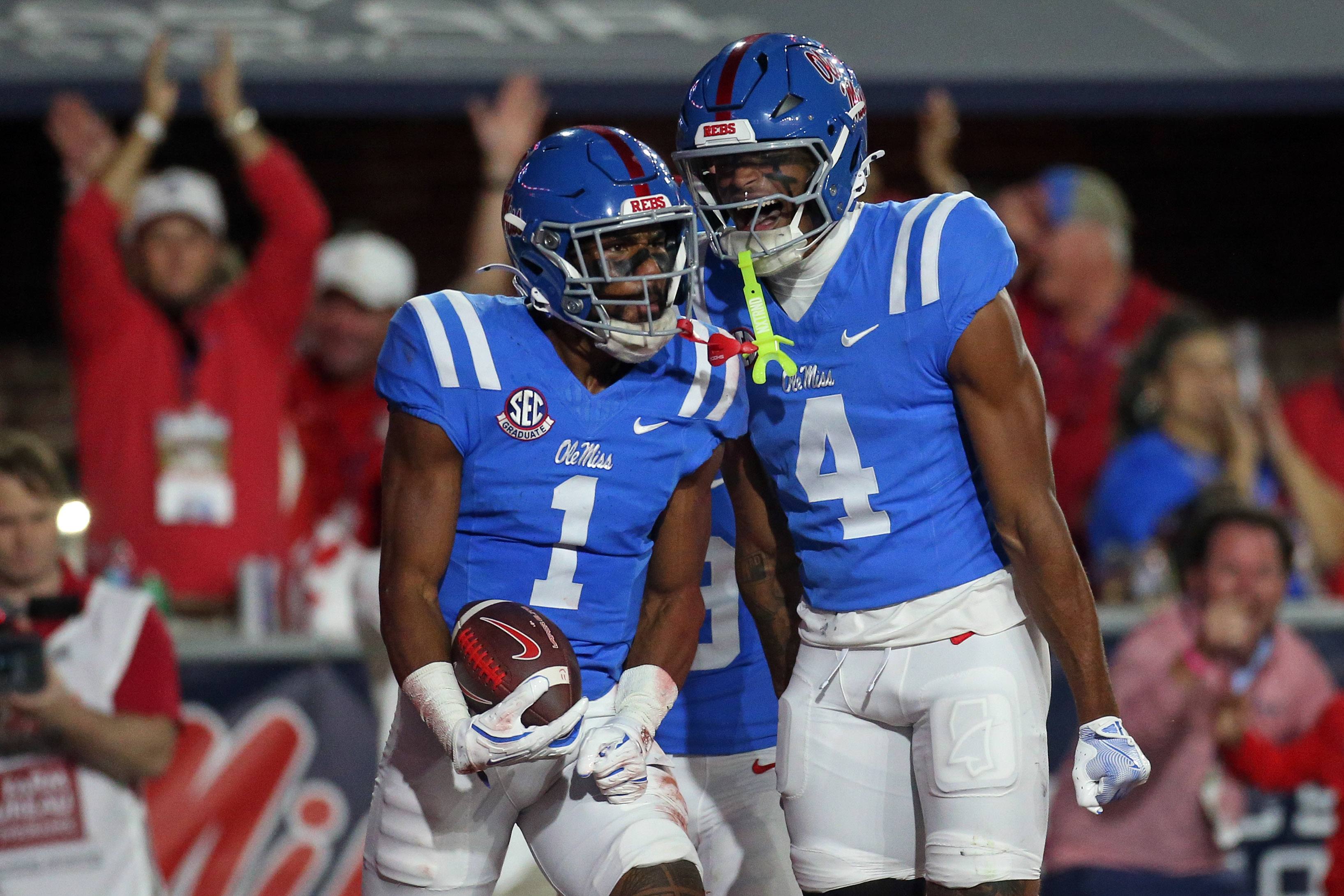Ole Miss wide receiver De'Zhaun Stribling (1) celebrates a touchdown with a teammate as we offer our Tulane vs. Ole Miss anytime touchdown scorer predictions.