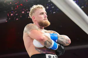 Jake Paul reacts after knocking out his opponent as we look at the Jake Paul vs. Mike Tyson odds and betting favorite