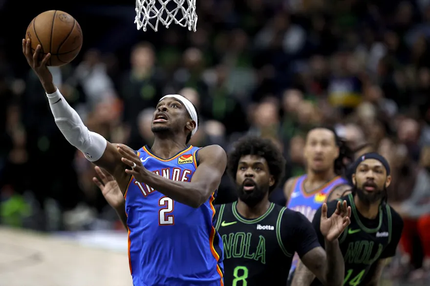 Shai Gilgeous-Alexander of the Oklahoma City Thunder goes to the basket as Naji Marshall of the New Orleans Pelicans looks on during Game 4 of the first round of the NBA playoffs. We're backing Gilgeous-Alexander in our NBA Player Props & Expert Picks. 