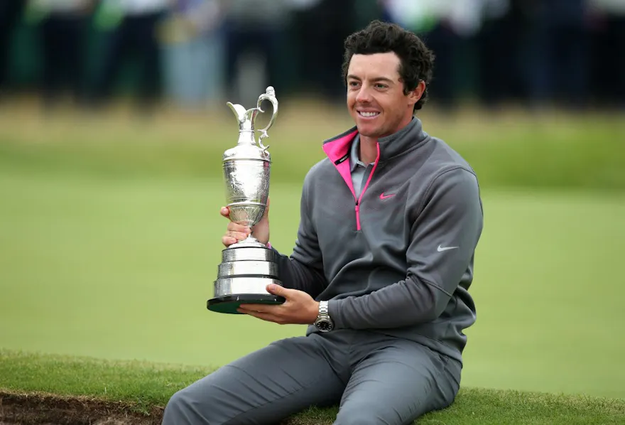 Northern Ireland's Rory McIlroy holds the Claret Jug as he poses and we look at the 2023 Open Championship odds.