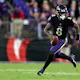 Lamar Jackson of the Baltimore Ravens rushes during the fourth quarter in a game against the Indianapolis Colts at M&T Bank Stadium in Baltimore, Maryland. Photo by Patrick Smith/Getty Images via AFP.