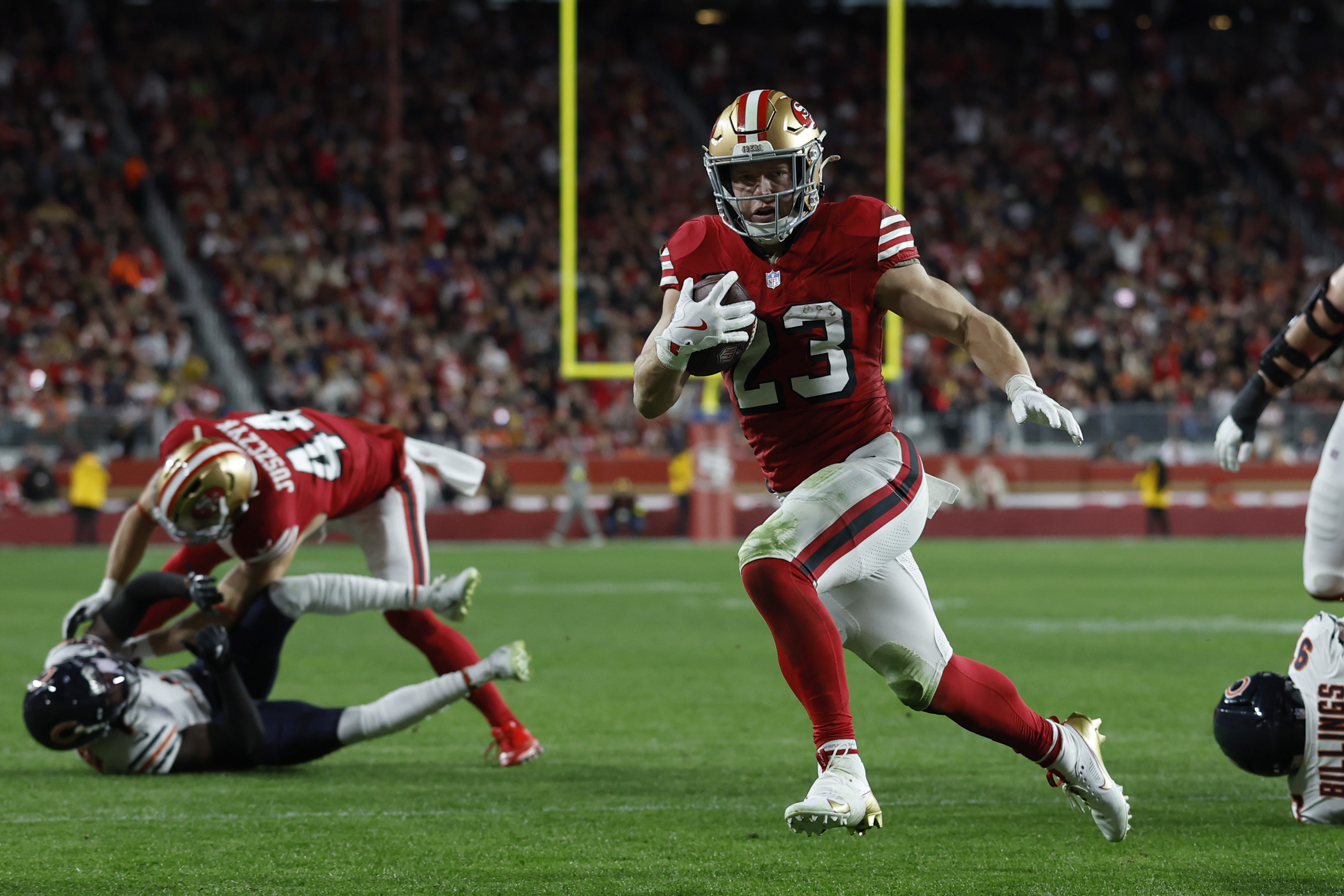 San Francisco 49ers running back Christian McCaffrey (23) runs for a touchdown as we break down our Seahawks vs. 49ers same-game parlay.