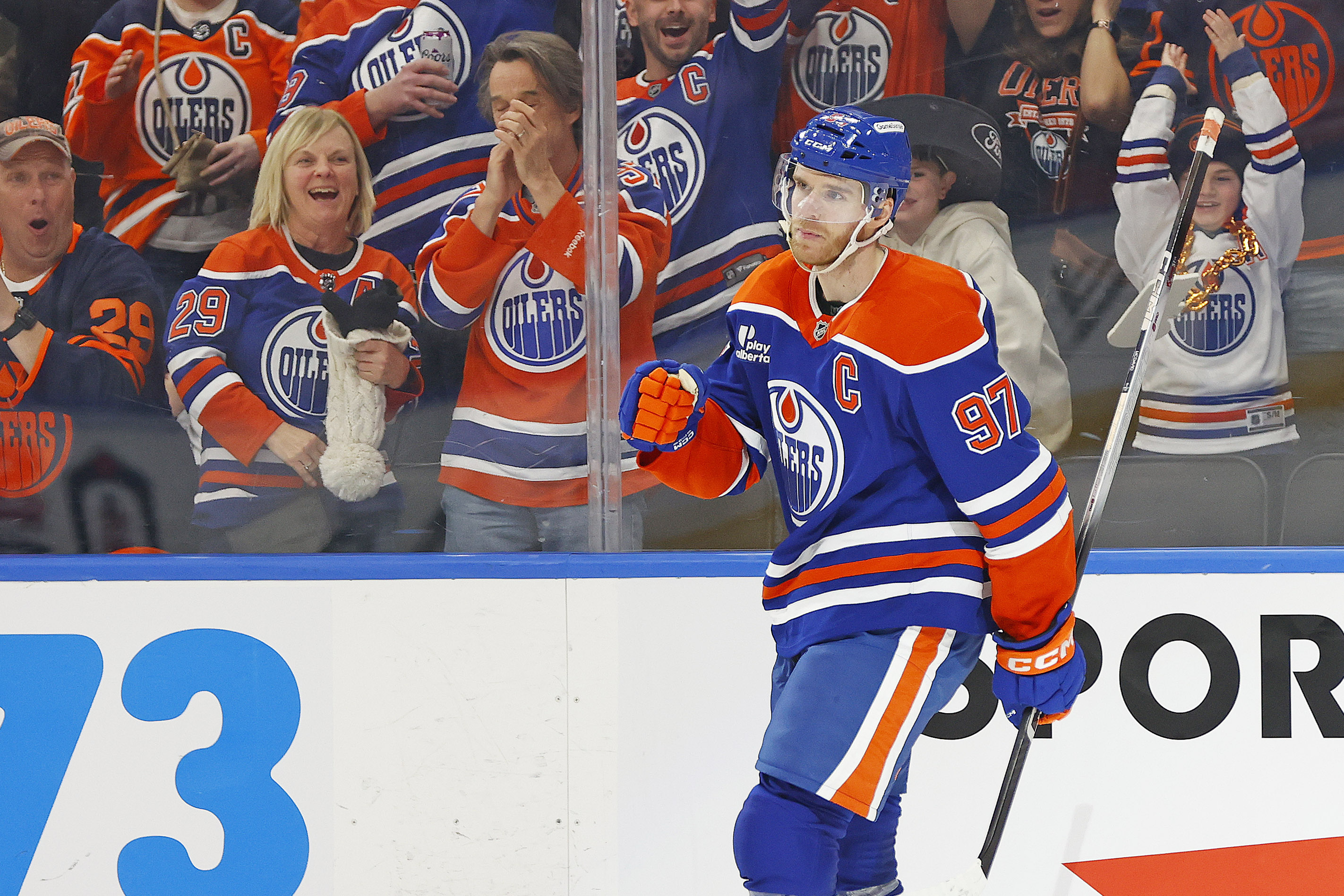 Edmonton Oilers forward Connor McDavid (97) celebrates after scoring as we offer our NHL anytime goal scorer predictions today.