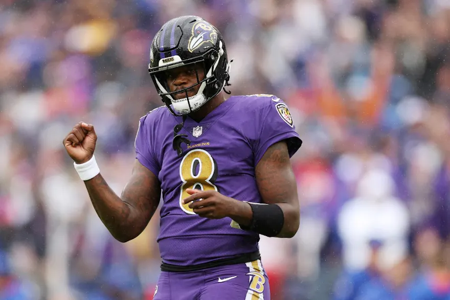 Lamar Jackson of the Baltimore Ravens celebrates a touchdown against the Buffalo Bills, and we offer our top Ravens vs. Jaguars predictions based on the best NFL odds.