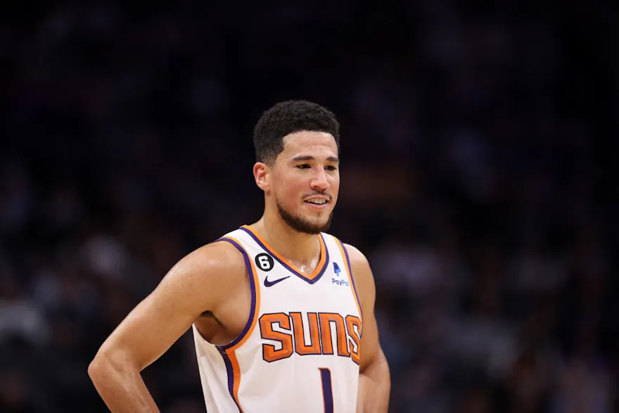 Devin Booker of the Phoenix Suns stands on the court during their game against the Sacramento Kings.