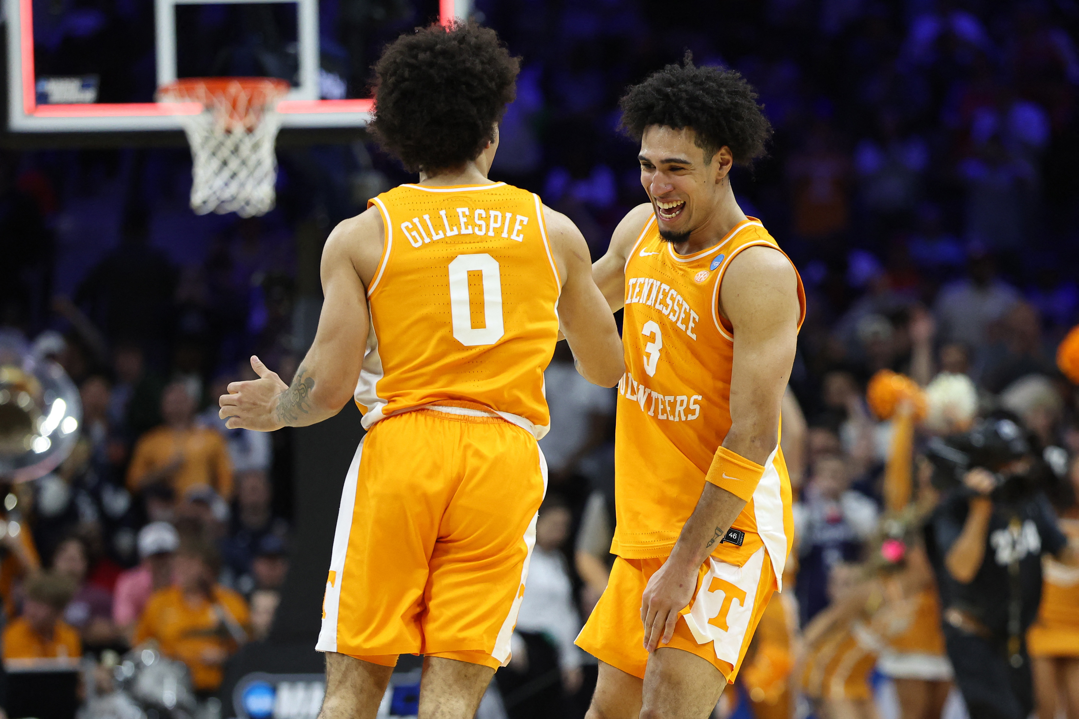 Ja'Kobi Gillespie (0) and Bishop Boswell (3), featured in our Tennessee vs. Iowa State prediction, react during a second-round win.