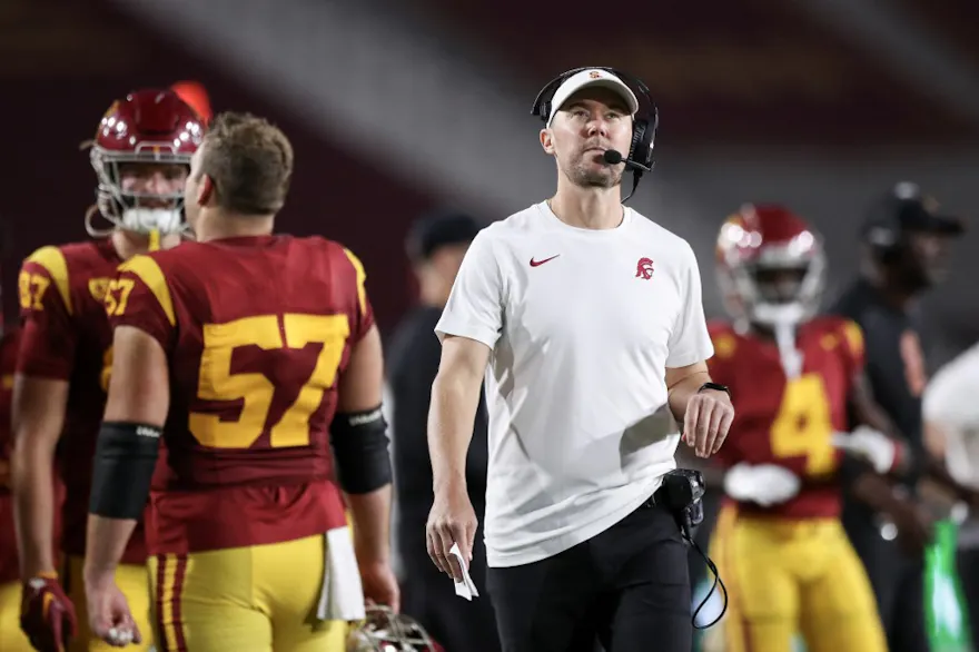 Head coach Lincoln Riley of the USC Trojans looks on as we make our Louisville vs. USC prediction and pick for the 2023 Holiday Bowl on Wednesday.