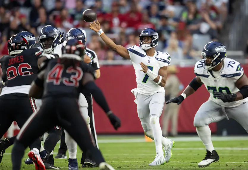 Seattle Seahawks quarterback Geno Smith against the Arizona Cardinals as we offer our Packers vs. Seahawks prediction.