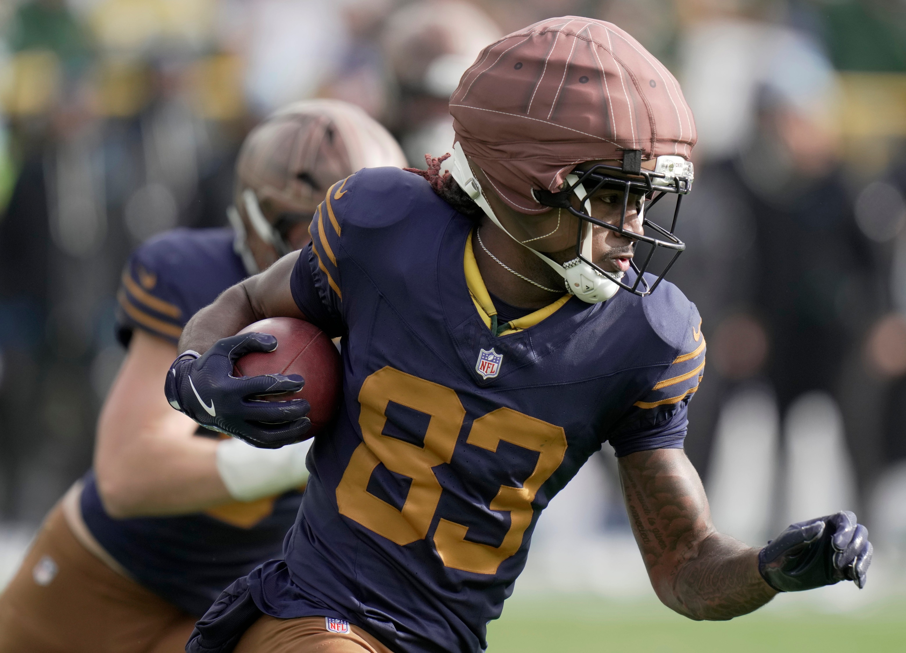 Green Bay Packers wide receiver Savion Williams returns a kickoff as we look at the pushback to the updated Wisconsin sports betting bill. 