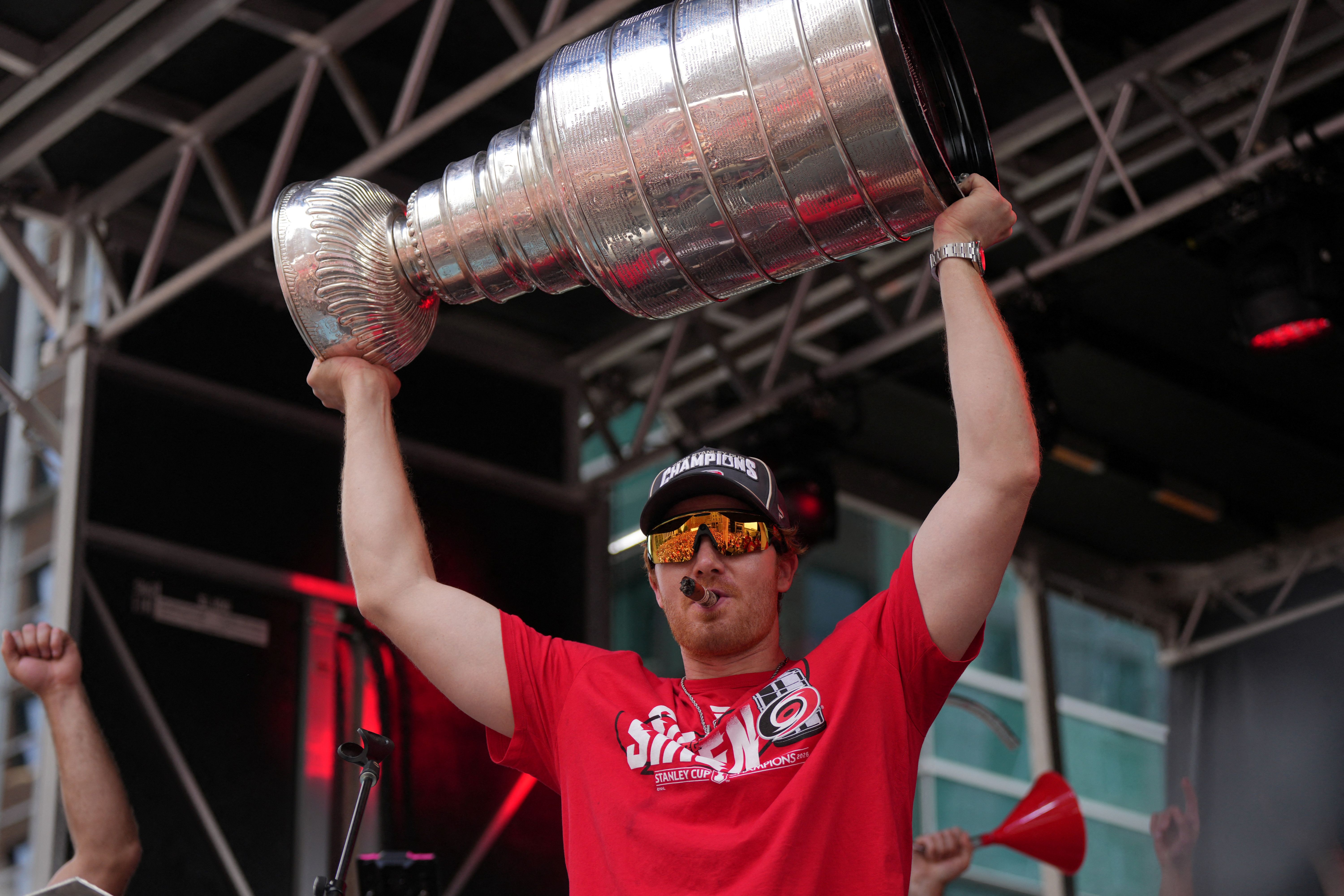 Carolina Hurricanes goaltender Frederik Andersen holds up the Stanley Cup trophy as we look at sports betting increases in the state.
