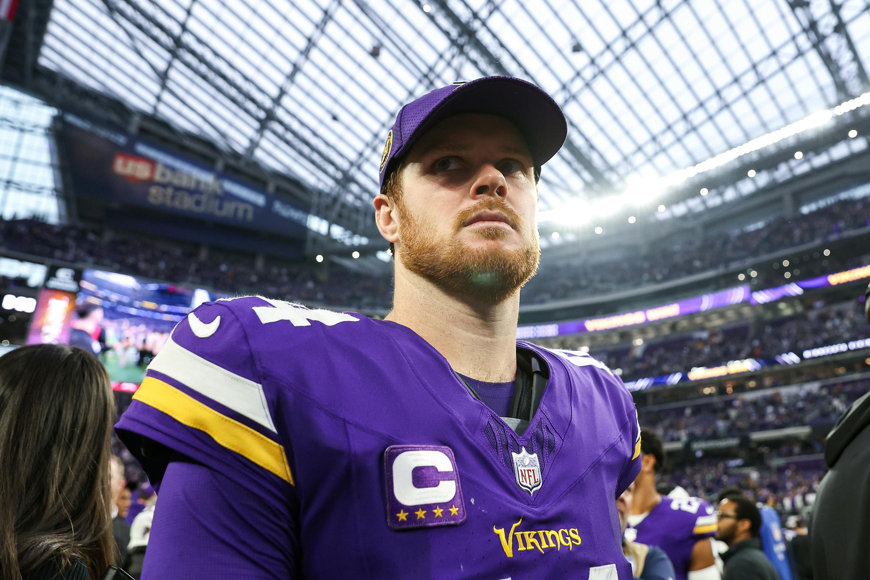 Minnesota Vikings quarterback Sam Darnold looks on after the game against the Atlanta Falcons, and his game against the Chicago Bears acts as half of the Monday night slate for our NFL Week 15 predictions. 