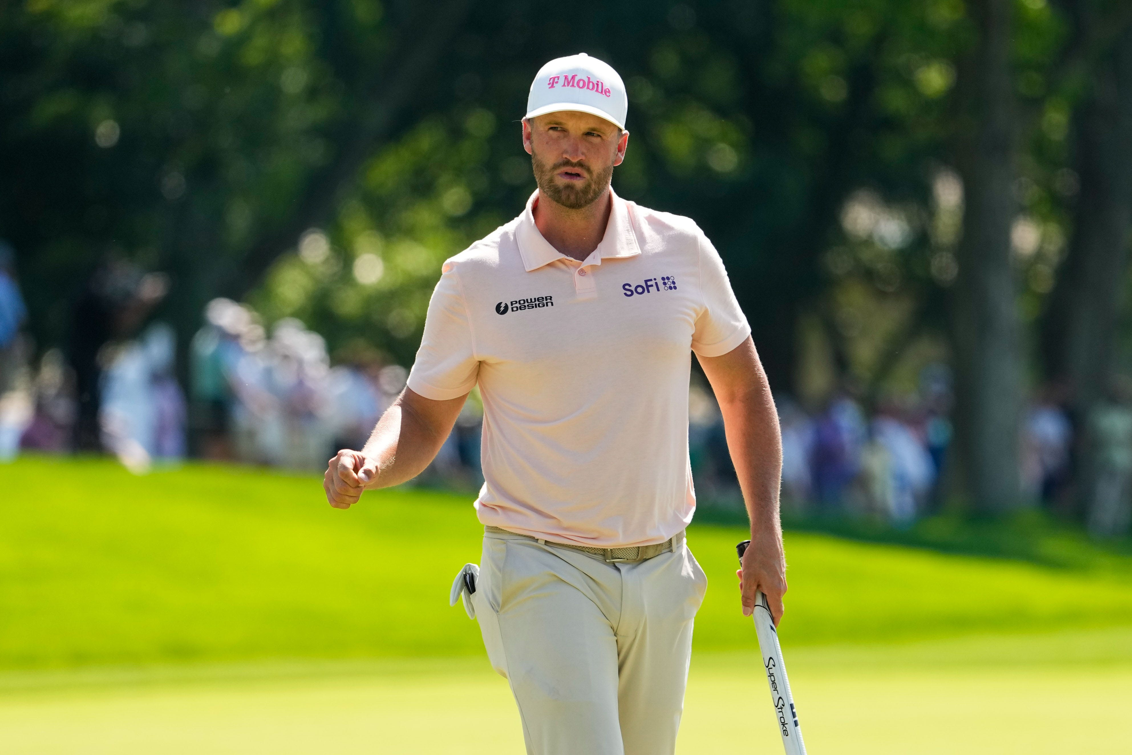 Wyndham Clark celebrates on the 13th green as he is featured in our RBC Canadian Open First-Round leader prediction & odds.