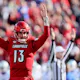 Jack Plummer #13 of the Louisville Cardinals celebrates a touchdown as we give our college football upset picks for conference championship week.