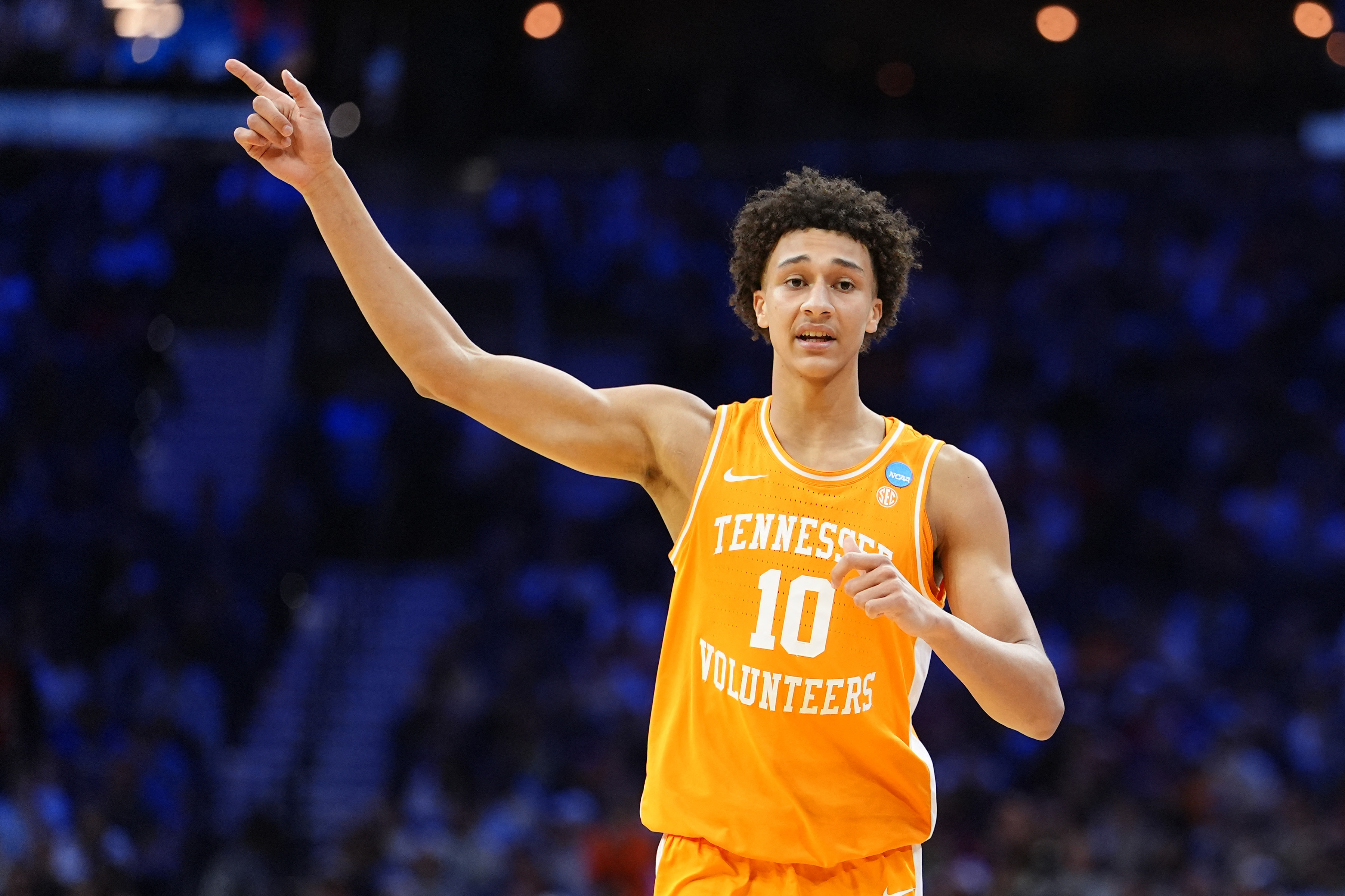 Tennessee's Nate Ament leads the Volunteers in one of four games covered in our March Madness predictions for Friday.