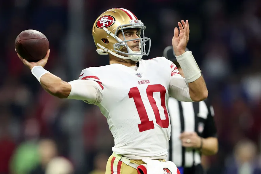 Jimmy Garoppolo of the San Francisco 49ers throws a pass against the Arizona Cardinals at Estadio Azteca on Nov. 21, 2022 in Mexico City, Mexico.