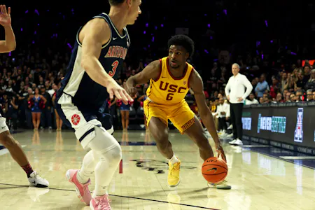 USC Trojans guard Bronny James drives to the net against Arizona Wildcats guard Pelle Larsson during the first half at McKale Center. We're looking at the Bronny James odds ahead of his rookie season.