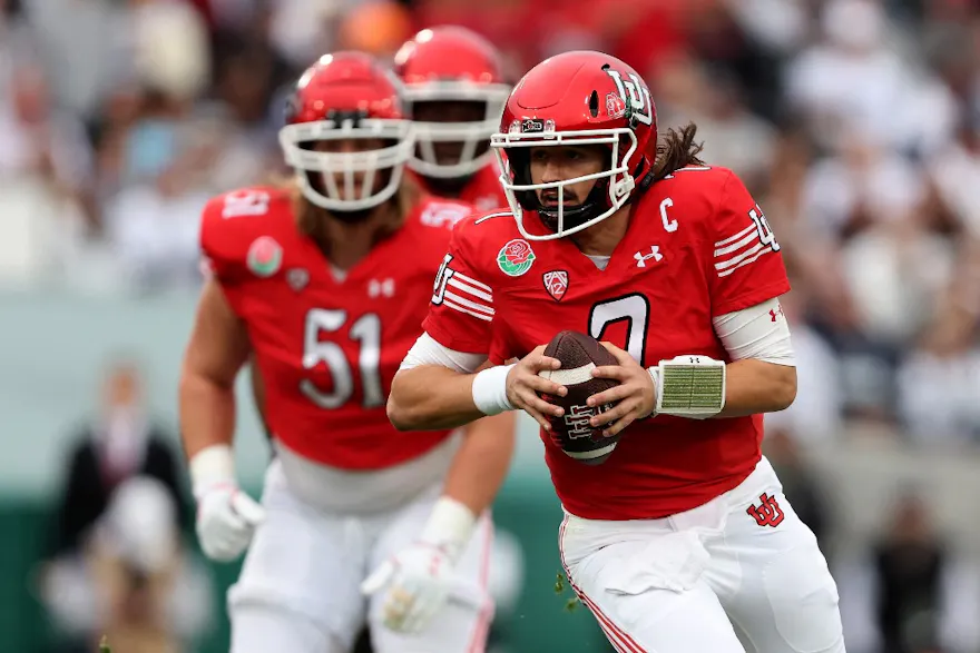 Cameron Rising of the Utah Utes scrambles against the Penn State Nittany Lions during the second quarter in the 2023 Rose Bowl. Utah is the favorite by the 2024 Big 12 Championship Odds. 