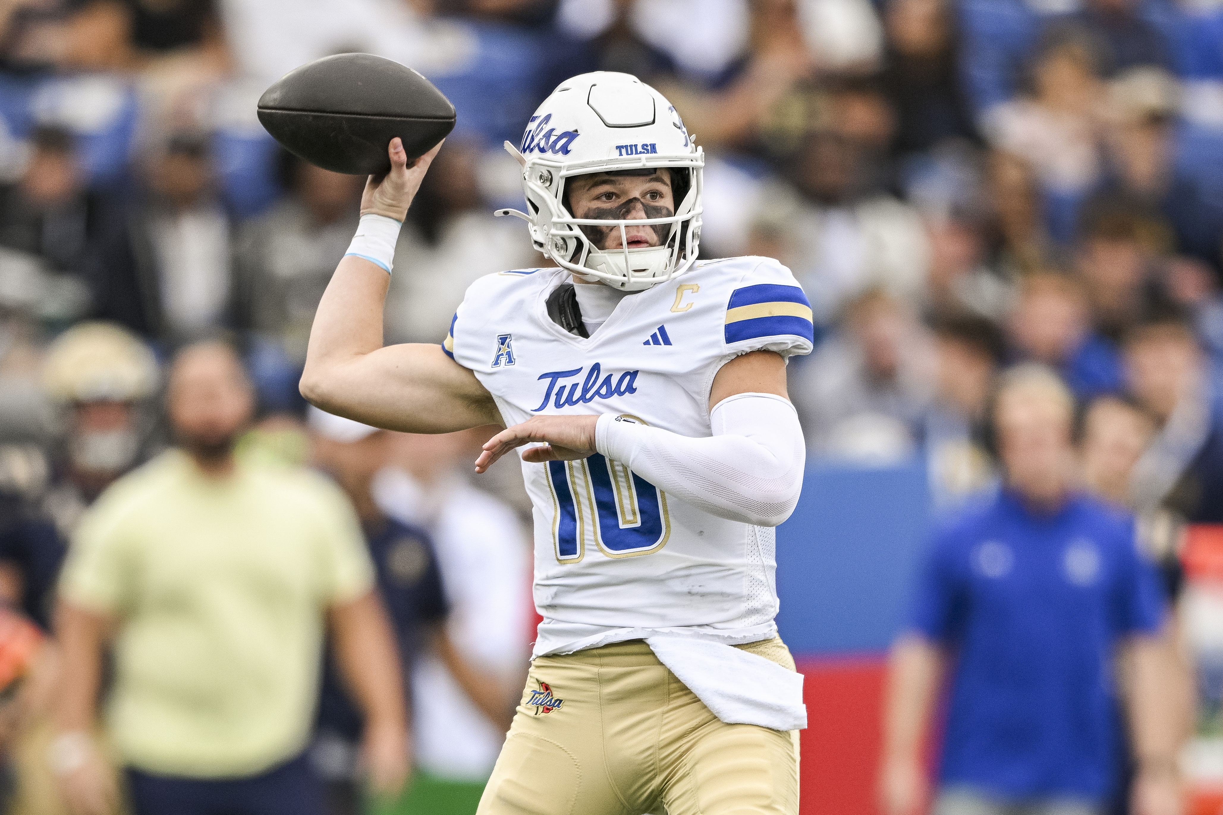 Tulsa Golden Hurricane quarterback Baylor Hayes (10) throws from the pocket as we make our best Week 8 college football ATS prediction. 