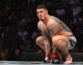 Tom Aspinall (red gloves) prior to the fight against Marcin Tybura (blue gloves) as we look at our best UFC 321 predictions