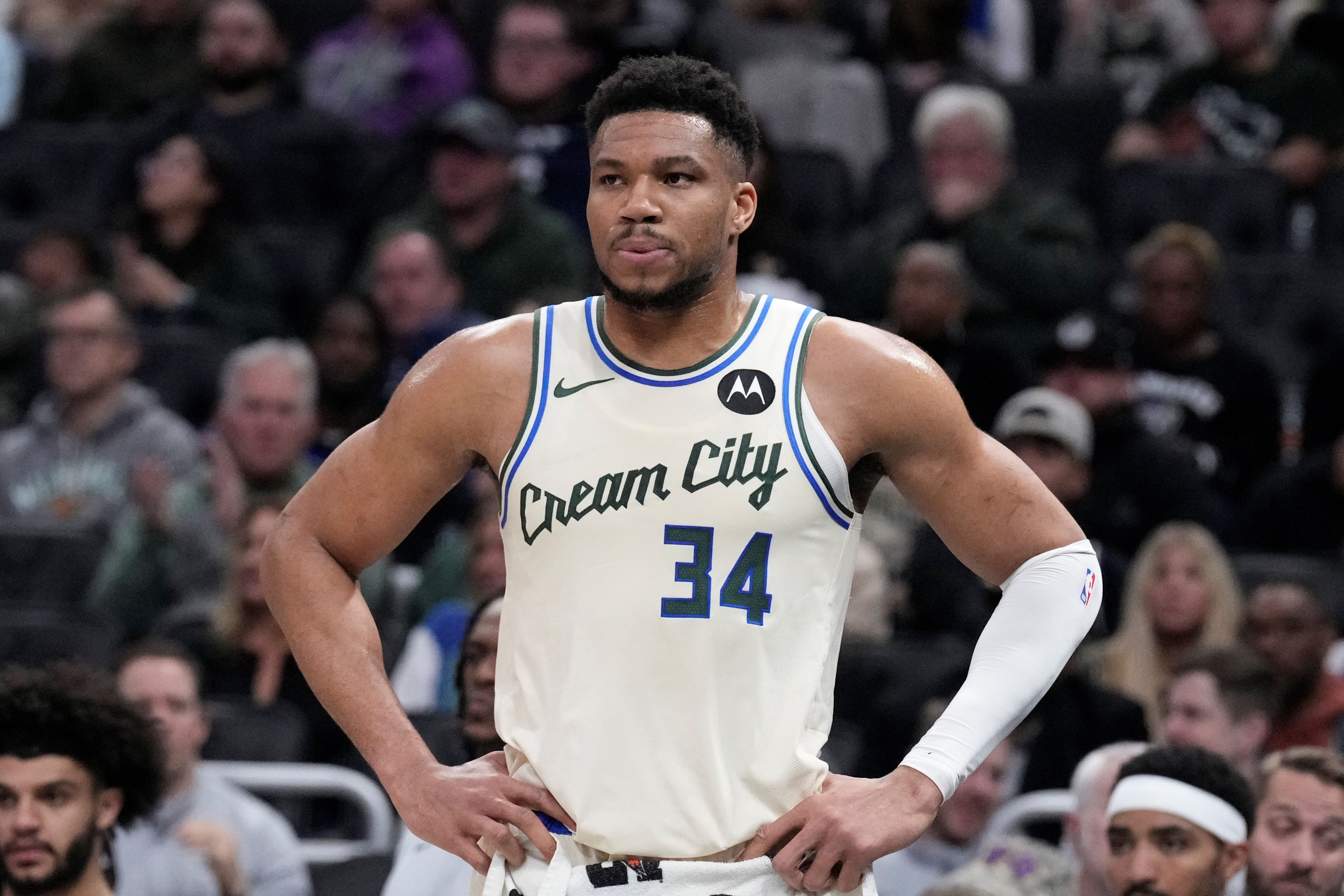 Milwaukee Bucks forward Giannis Antetokounmpo watches, and he's key to our NBA player props today