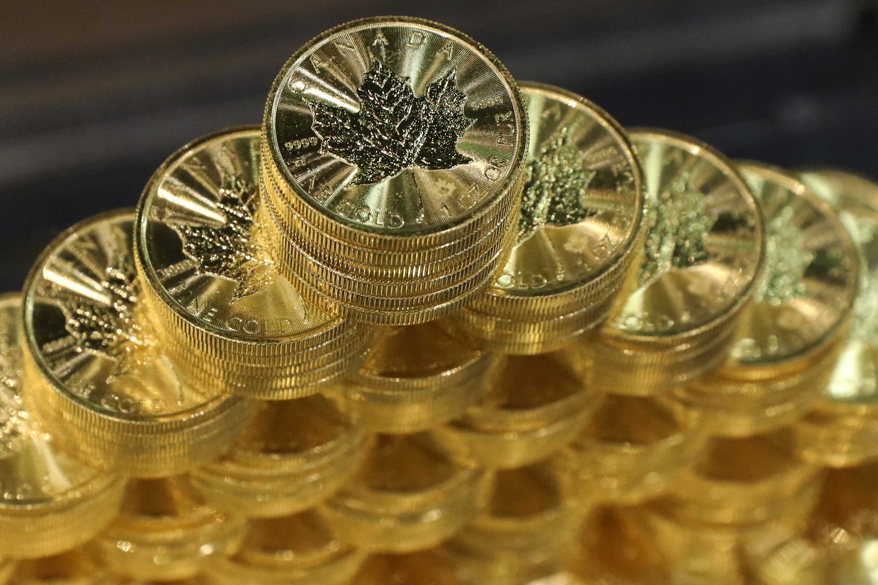 Part of a stack of 500 Canadian gold coins as we look at Wealthsimple's plan to launch prediction markets in Canada.