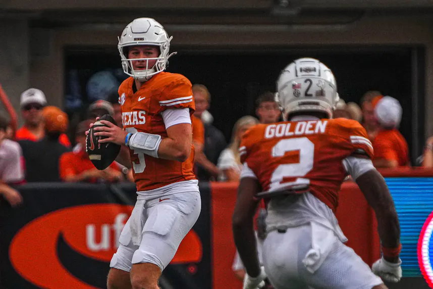 Texas quarterback Quinn Ewers looks for an open receiver against UTSA. We're backing the Longhorns in our Texas vs. Oklahoma prediction.