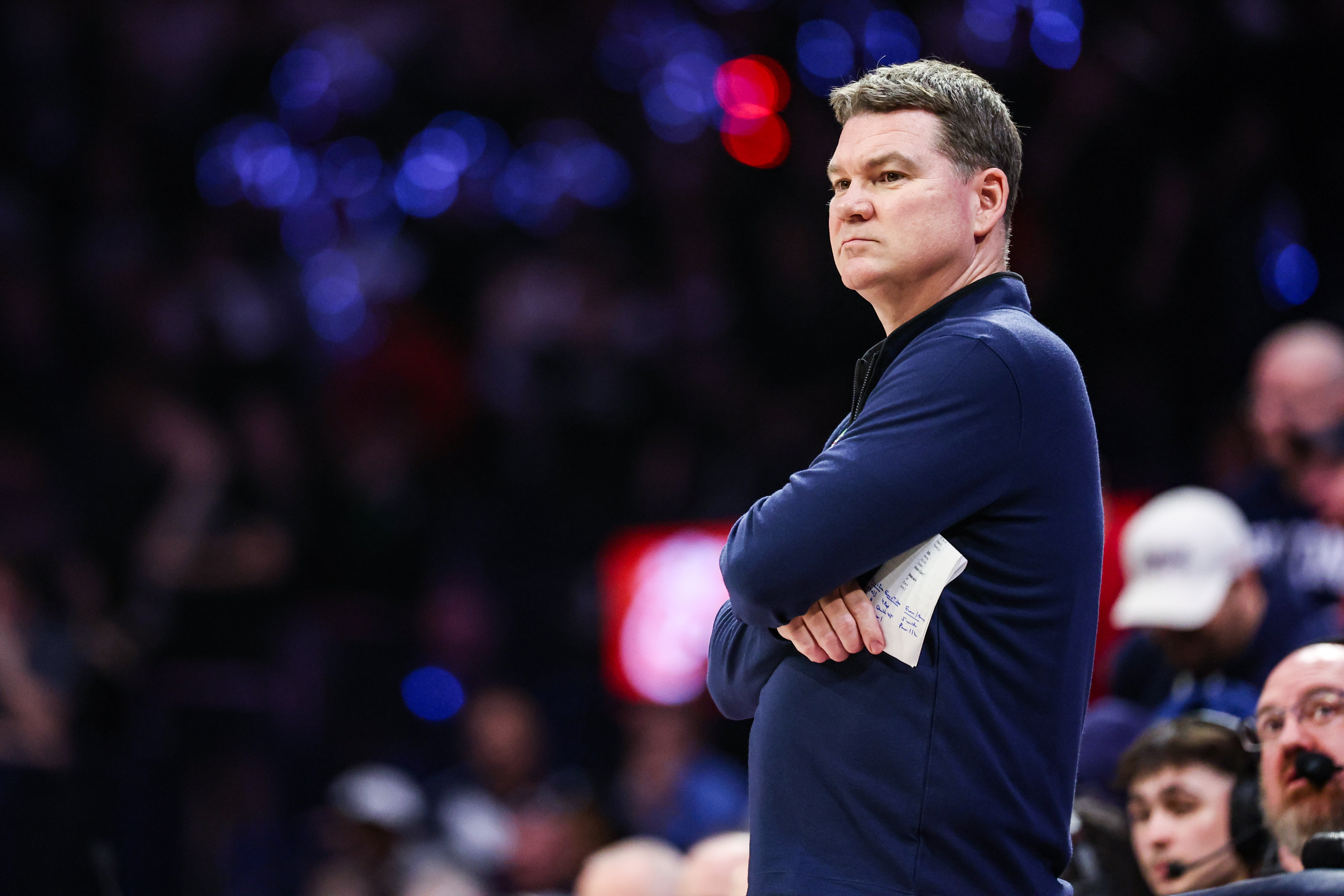 Arizona Wildcats head coach Tommy Lloyd looks on, as we break down the next UNC head coach odds and predictions.