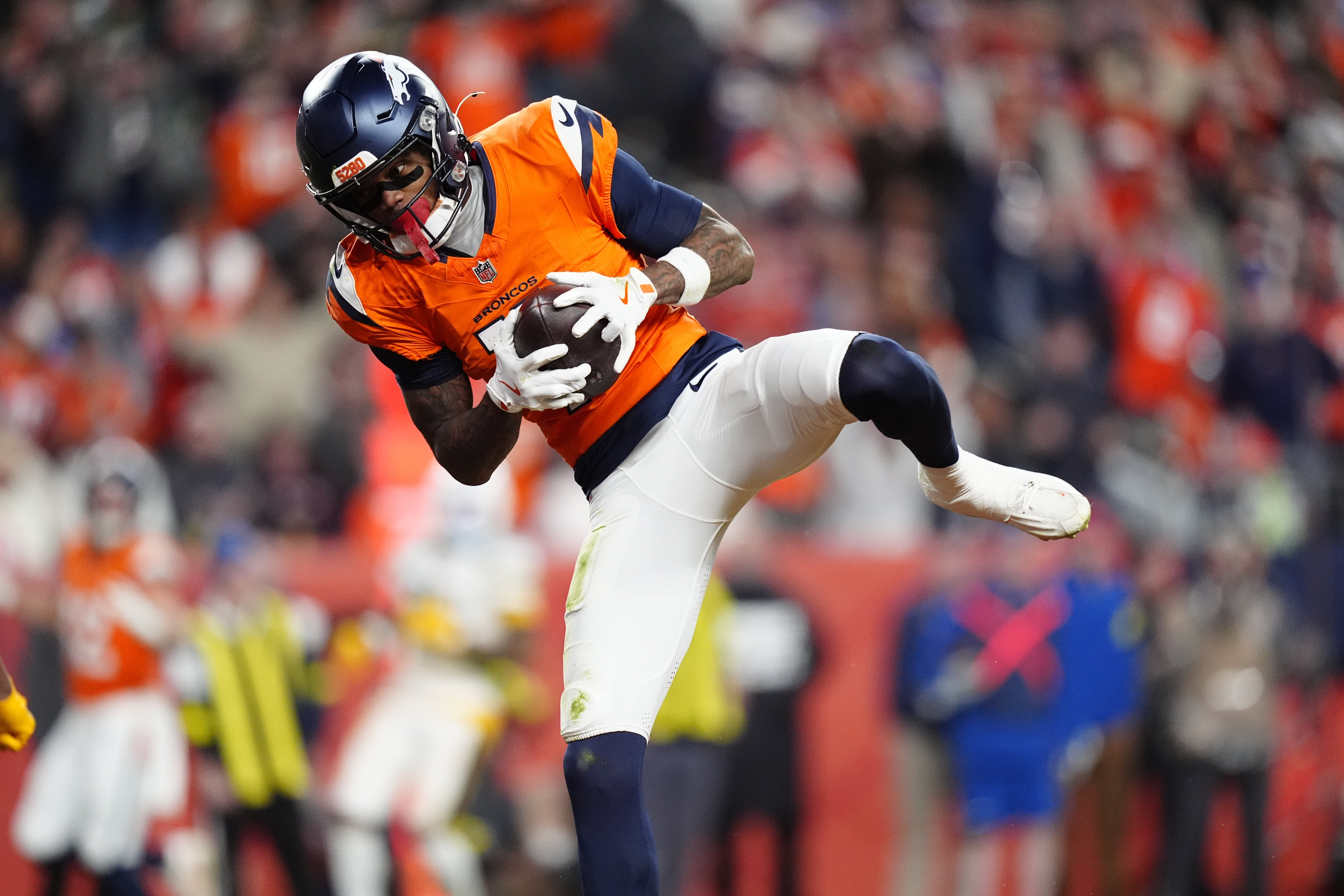 Denver Broncos wide receiver Troy Franklin celebrates following a touchdown as we make our best first touchdown scorer predictions for Bills vs. Broncos