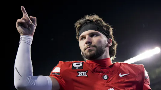Cincinnati Bearcats quarterback Brendan Sorsby points to fans as he walks off the field as part of our Cincinnati vs. Utah Prediction & Odds.