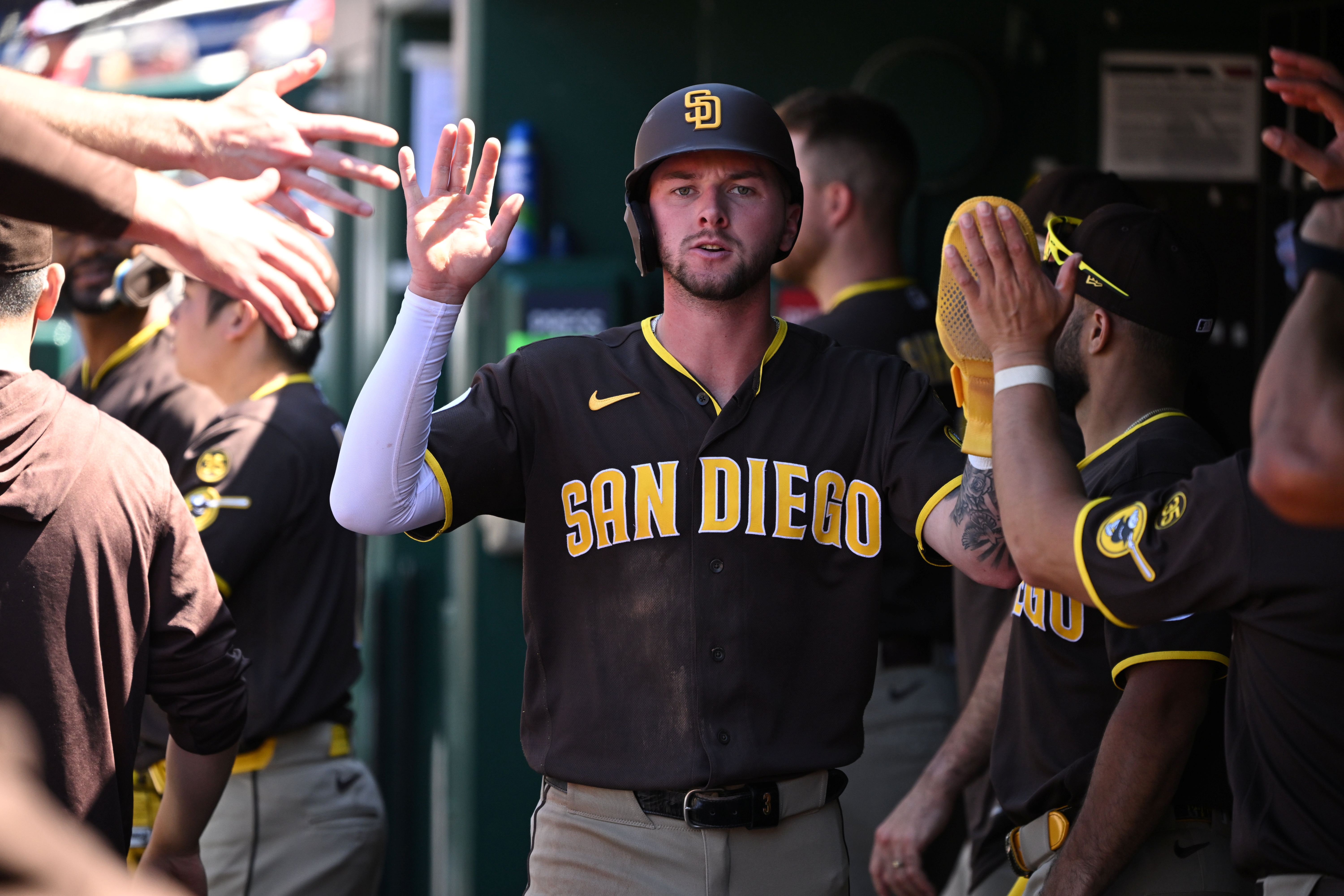 San Diego Padres center fielder Jackson Merrill celebrates, and he's featured in my Braves vs. Padres win probability.