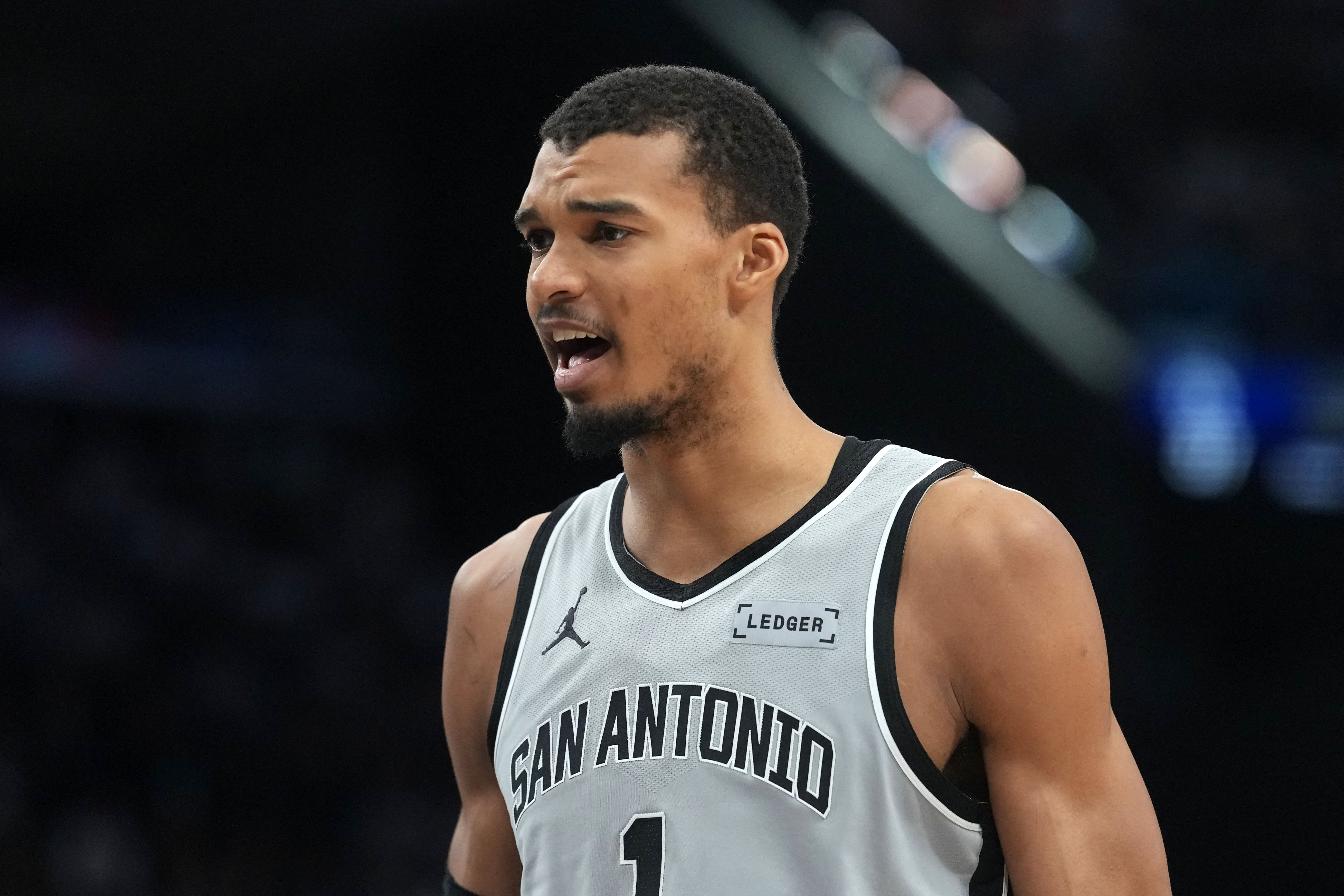 San Antonio Spurs forward Victor Wembanyama (1) reacts as we break down our NBA player props tonight.