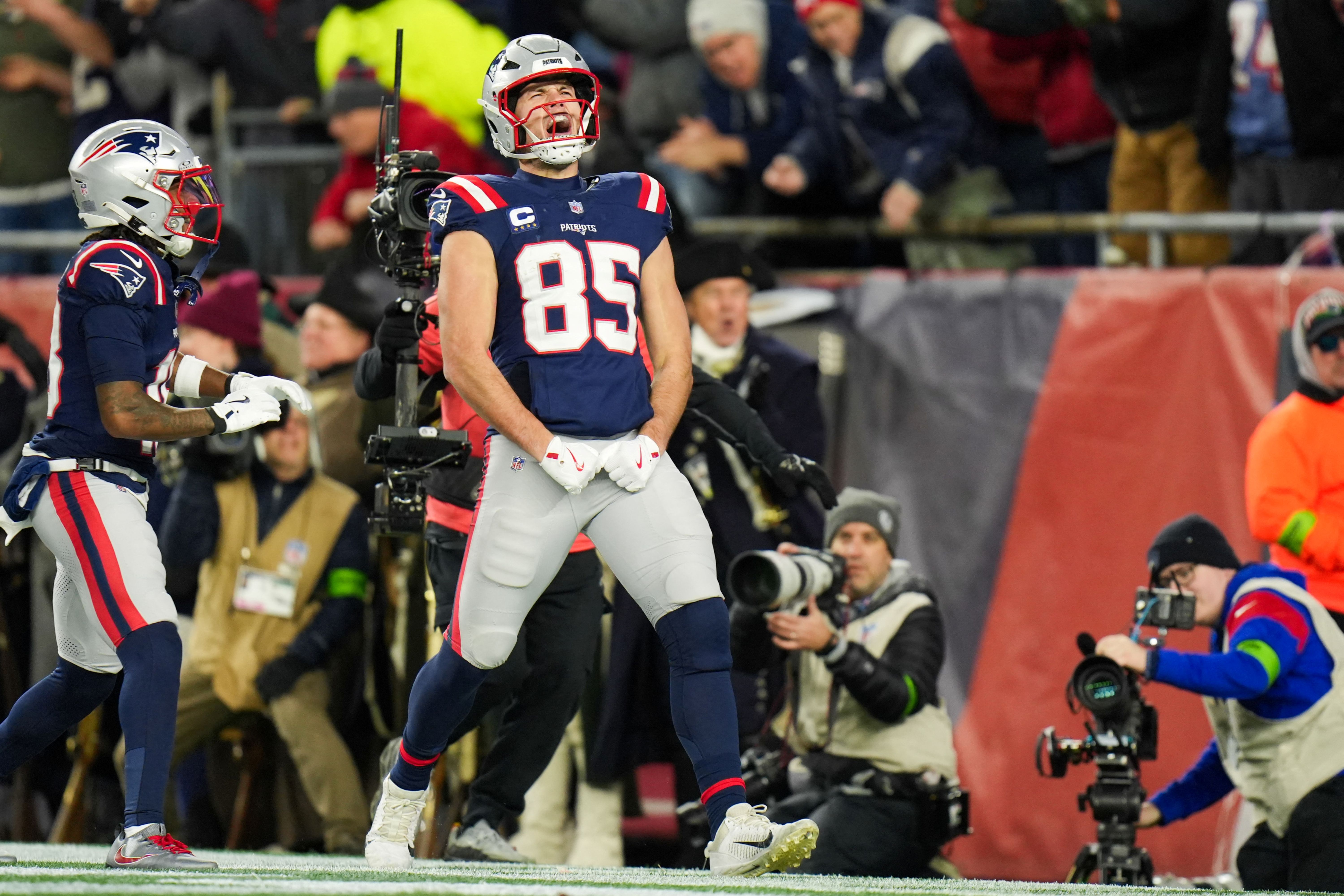 New England Patriots tight end Hunter Henry celebrates after scoring a touchdown and he's key to our Seahawks vs. Patriots tight end player props
