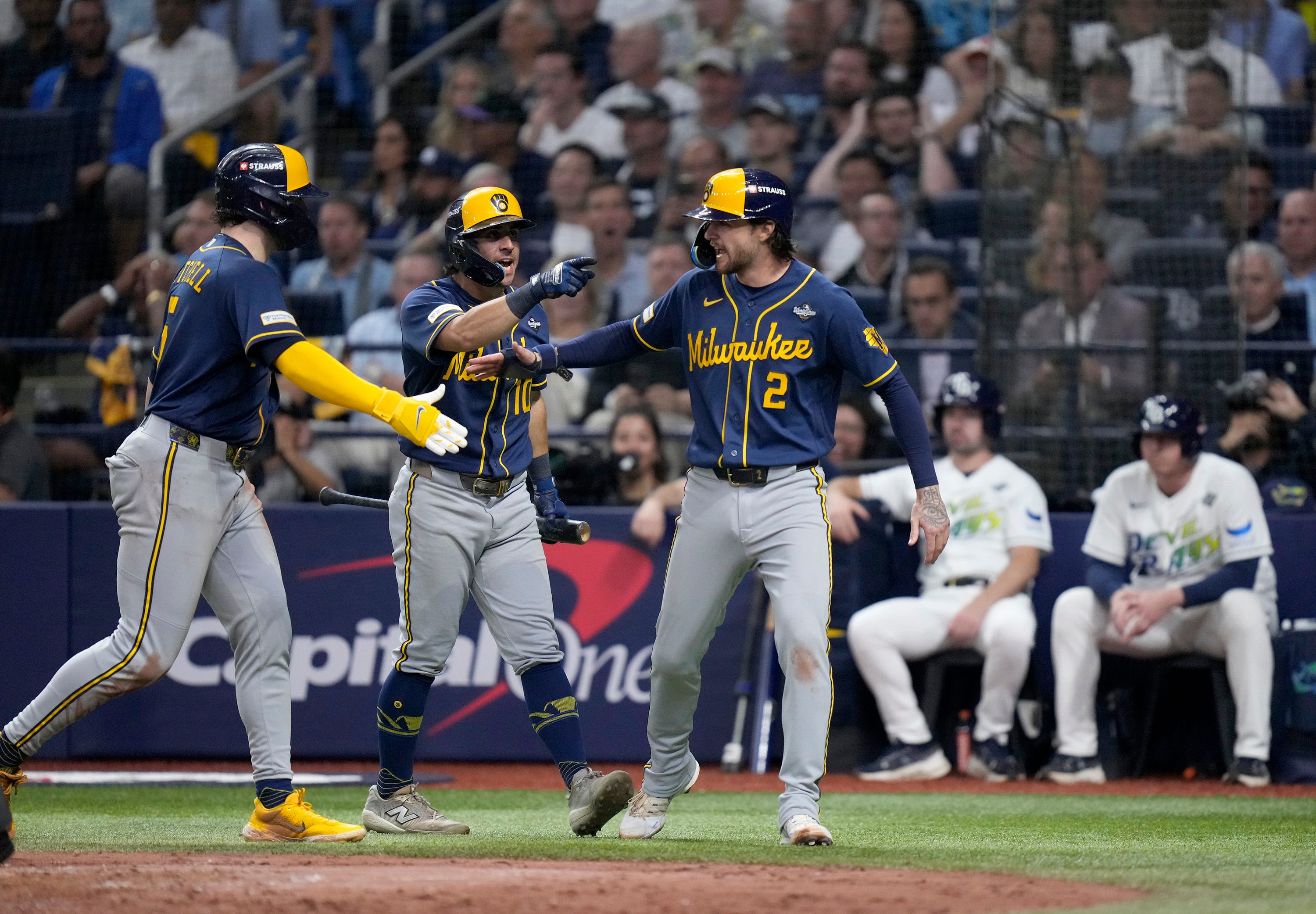 Milwaukee Brewers players celebrate in the fifth inning against the Tampa Bay Rays at Tropicana Field during Game 3 of the World Series, as we take a closer look at the World Series odds. 