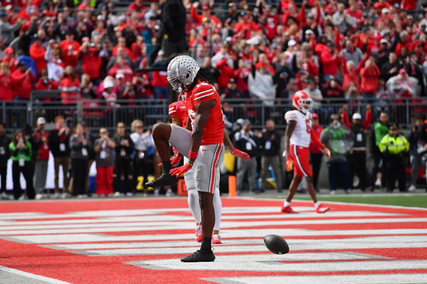 Marvin Harrison Jr. of the Ohio State Buckeyes celebrates his touchdown against the Maryland Terrapins, and we offer new U.S. bettors our exclusive BetRivers bonus code.