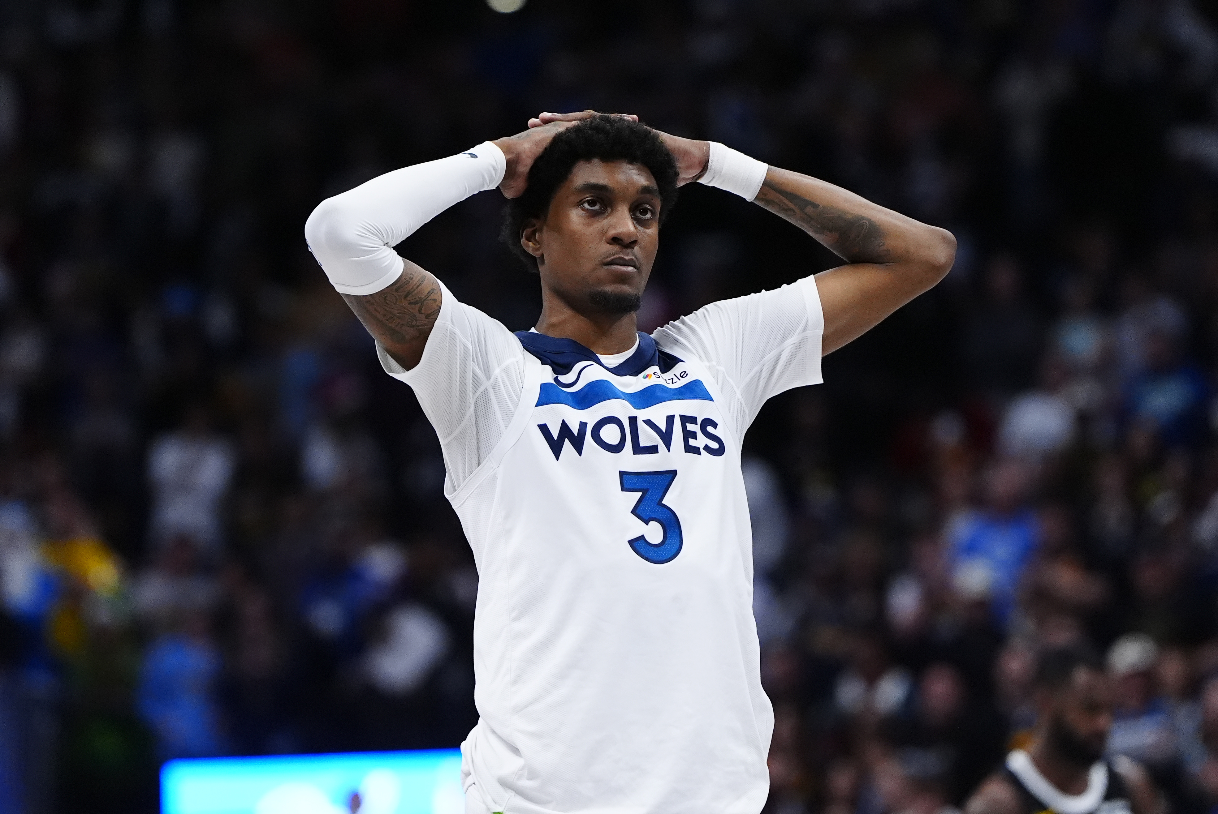 Minnesota Timberwolves forward Jaden McDaniels (3), seen here reacting during a game, is featured in our NBA player props tonight.