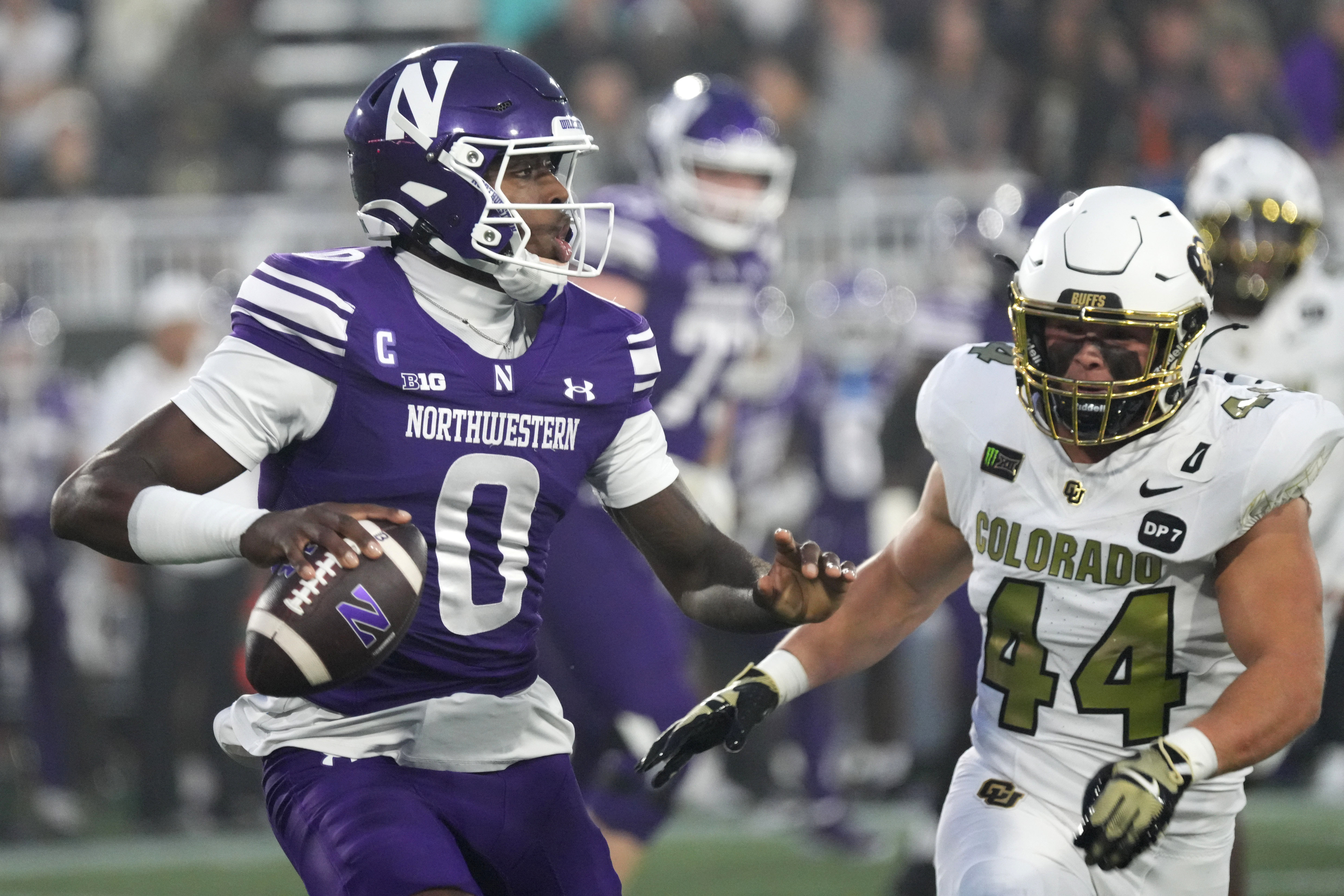 Pictured: Wildcats quarterback Aidan Chiles in action as we break down our Northwestern vs. Indiana Prediction. Photo by David Banks-Imagn Images.