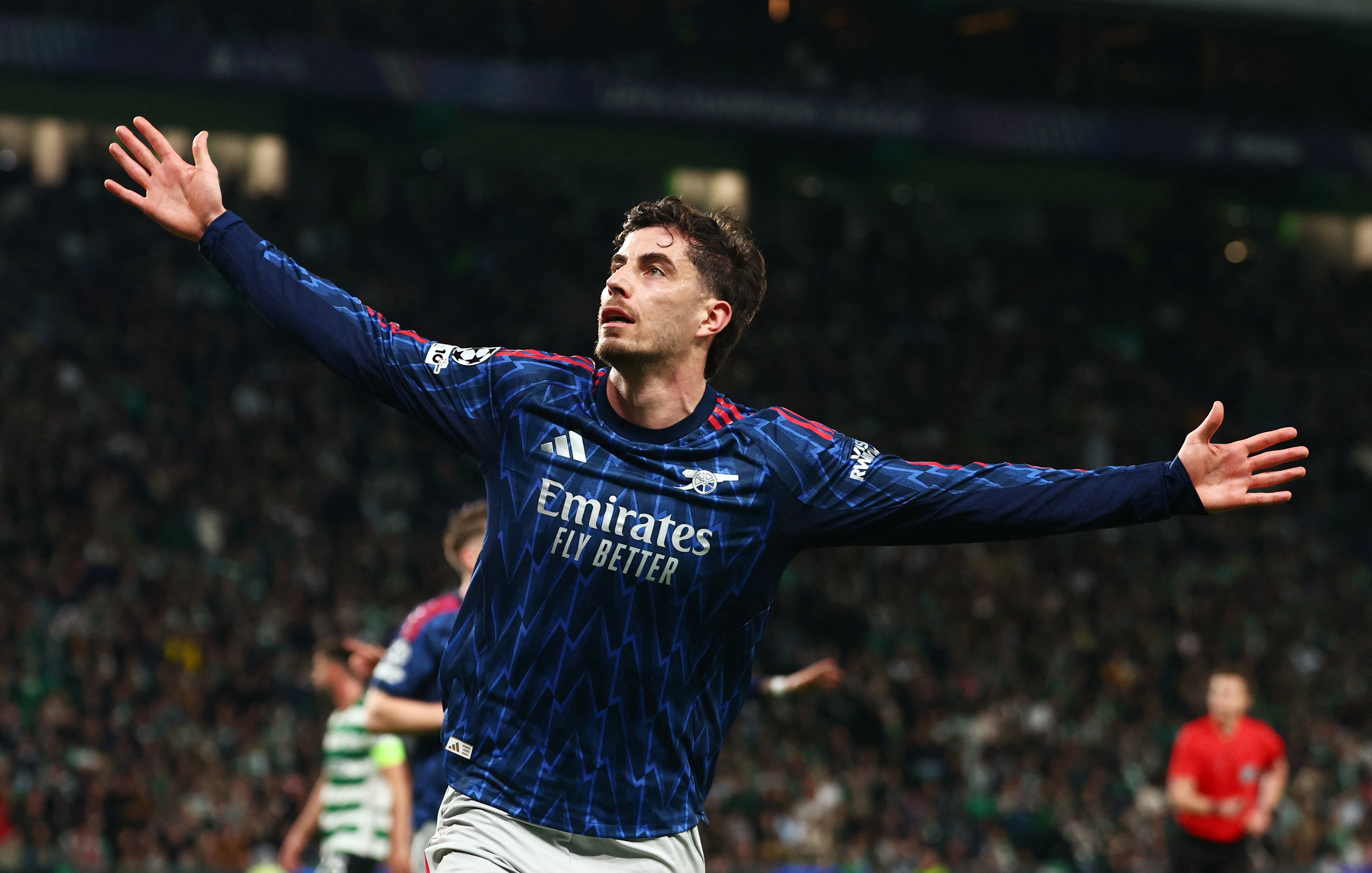 Arsenal's Kai Havertz celebrates scoring as we make our best Arsenal vs. Sporting CP prediction.