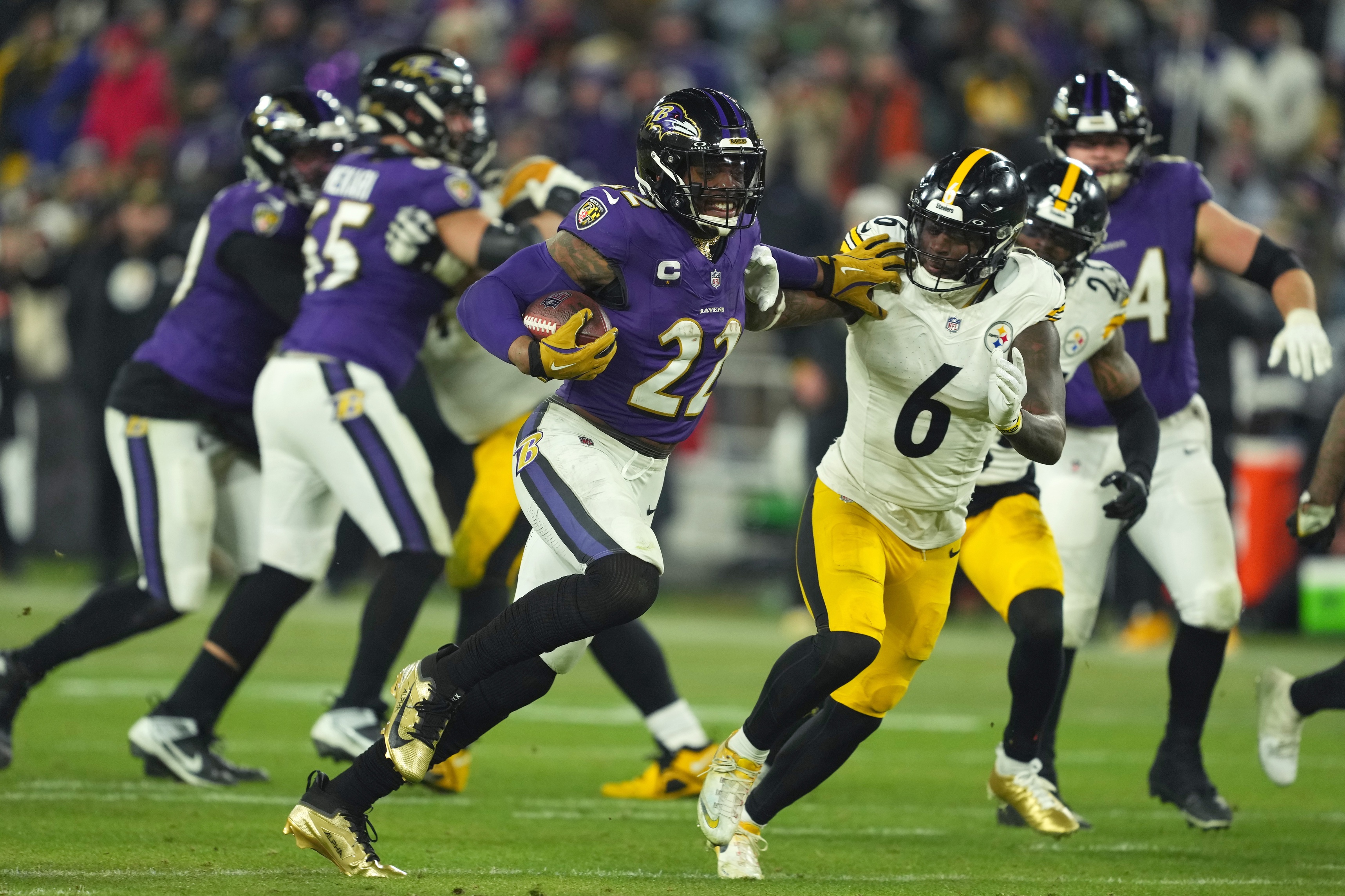 Derrick Henry runs to score a touchdown as we offer our Ravens vs. Steelers predictions and opening odds. 