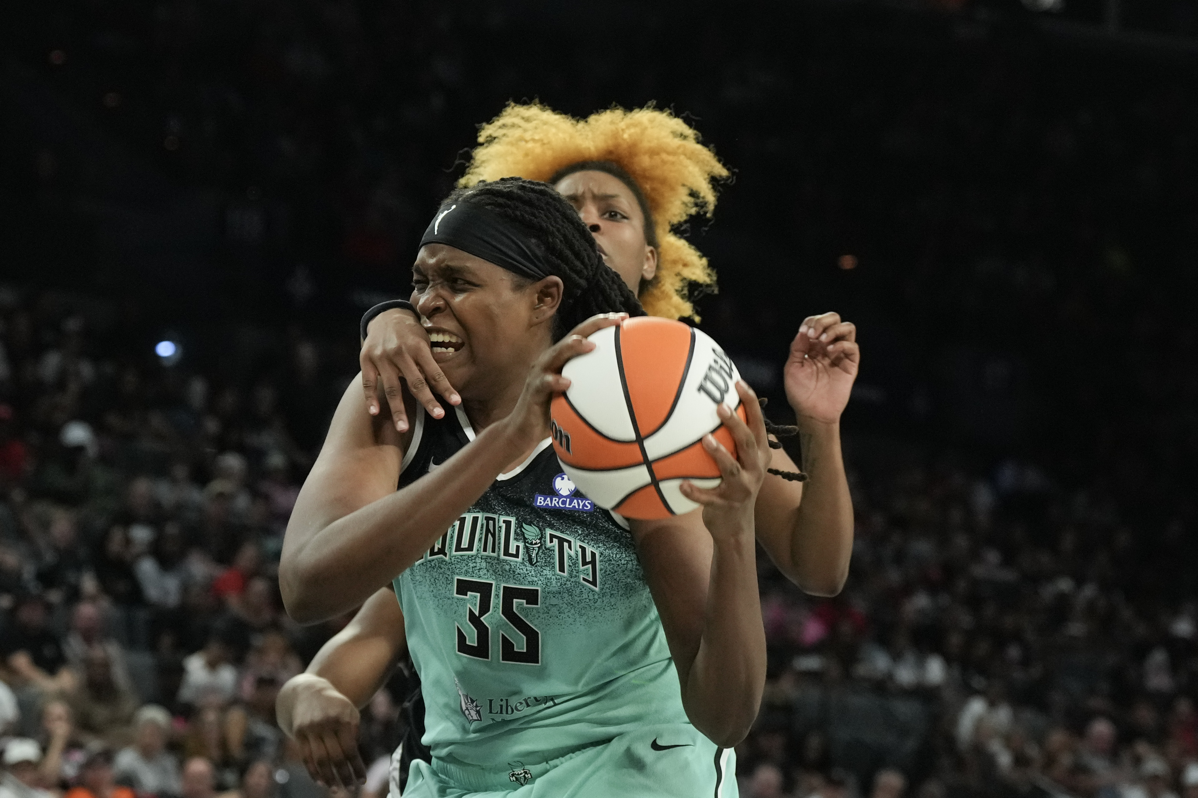 Las Vegas Aces forward NaLyssa Smith (3) fouls New York Liberty center Jonquel Jones (35) as we break down our Liberty vs. Aces prediction.