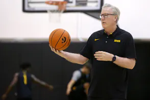 Iowa head coach Fran McCaffery watches practice as we look at the sports betting financials for Iowa in June 2024