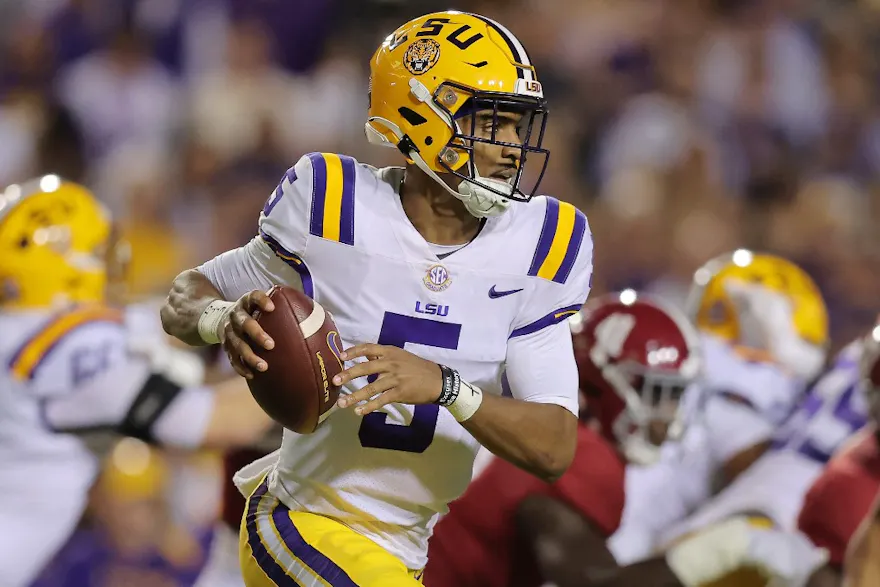 Jayden Daniels #5 of the LSU Tigers runs with the ball during the first half against the Alabama Crimson Tide at Tiger Stadium on Nov. 5. 