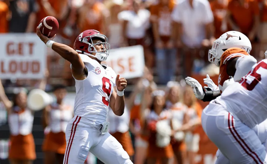 Bryce Young #9 of the Alabama Crimson Tide throws a pass under pressure in the third quarter versus the Texas Longhorns at Darrell K Royal-Texas Memorial Stadium on September 10, 2022 in Austin, Texas.