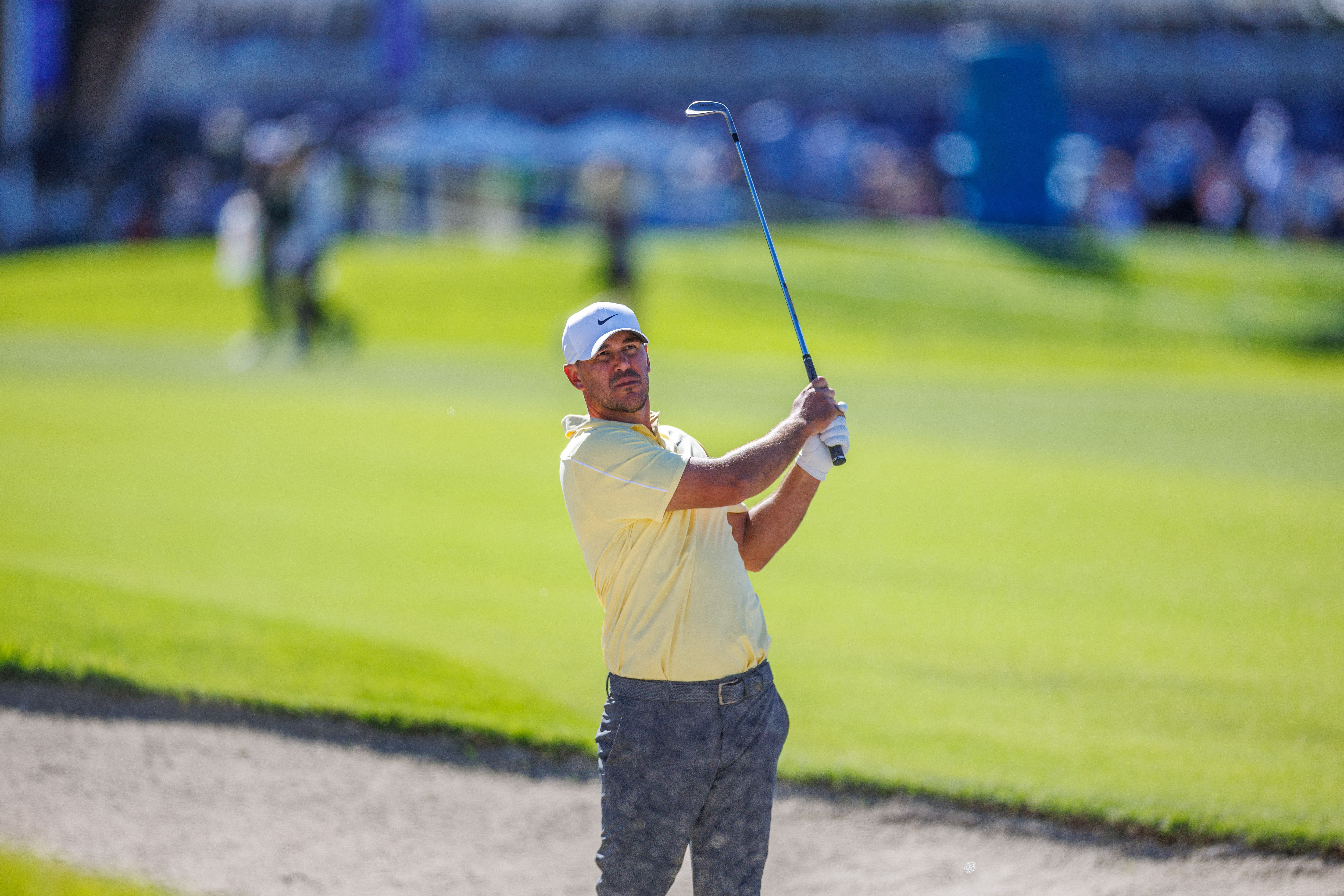 Brooks Koepka - who's featured in my Cognizant Classic picks - plays a shot from a bunker.