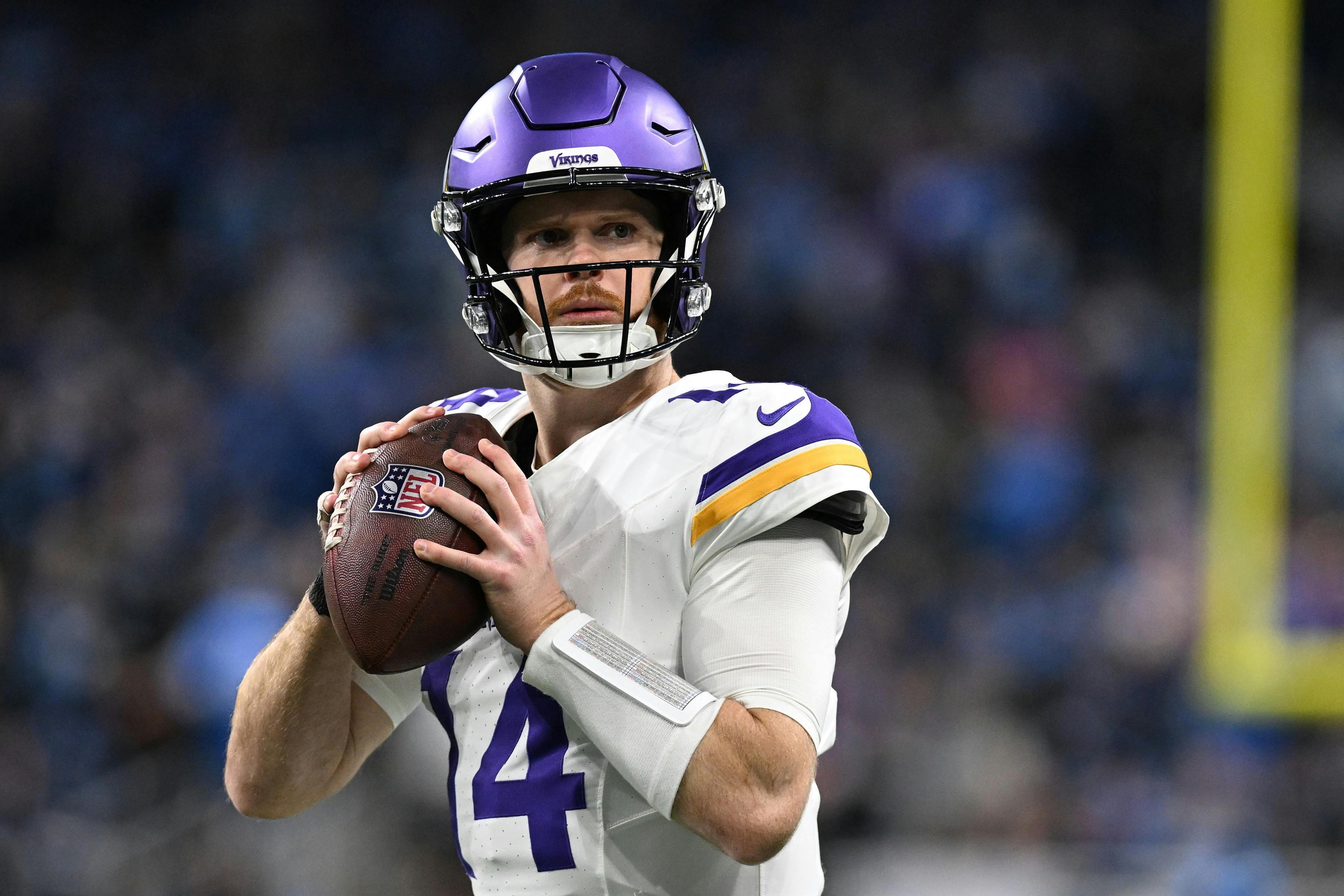 Minnesota Vikings quarterback Sam Darnold (14) throws passes as we look at our Wild Card Weekend best bets.