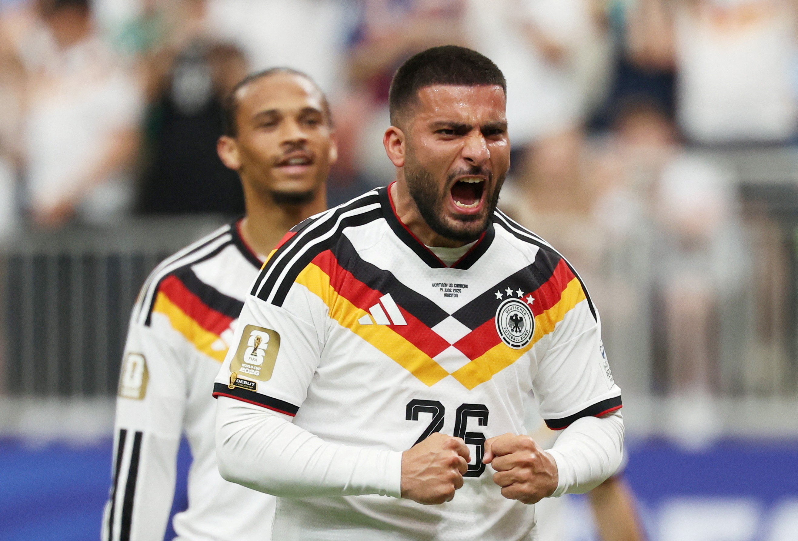 Germany's Deniz Undav - who's featured in our World Cup predictions - celebrates scoring their sixth goal with Leroy Sane. 