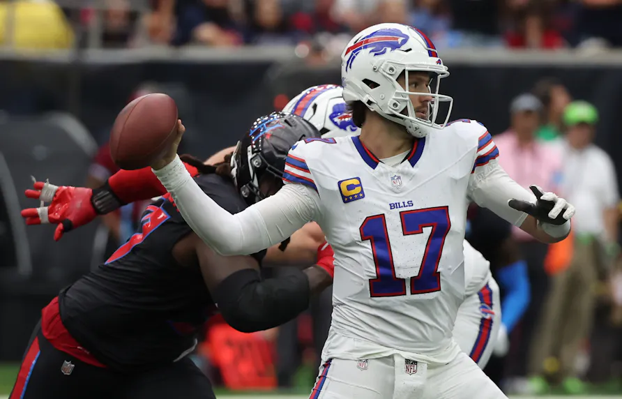 Buffalo Bills quarterback Josh Allen drops back to pass against the Houston Texans in the second half at NRG Stadium as we offer our Josh Allen player props.