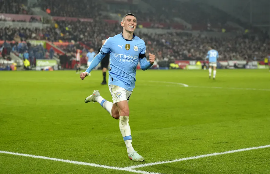 Manchester City's Phil Foden celebrates scoring their side's second goal of the game as we make our PSG vs. Man City prediction ahead of the UEFA Champions League clash.