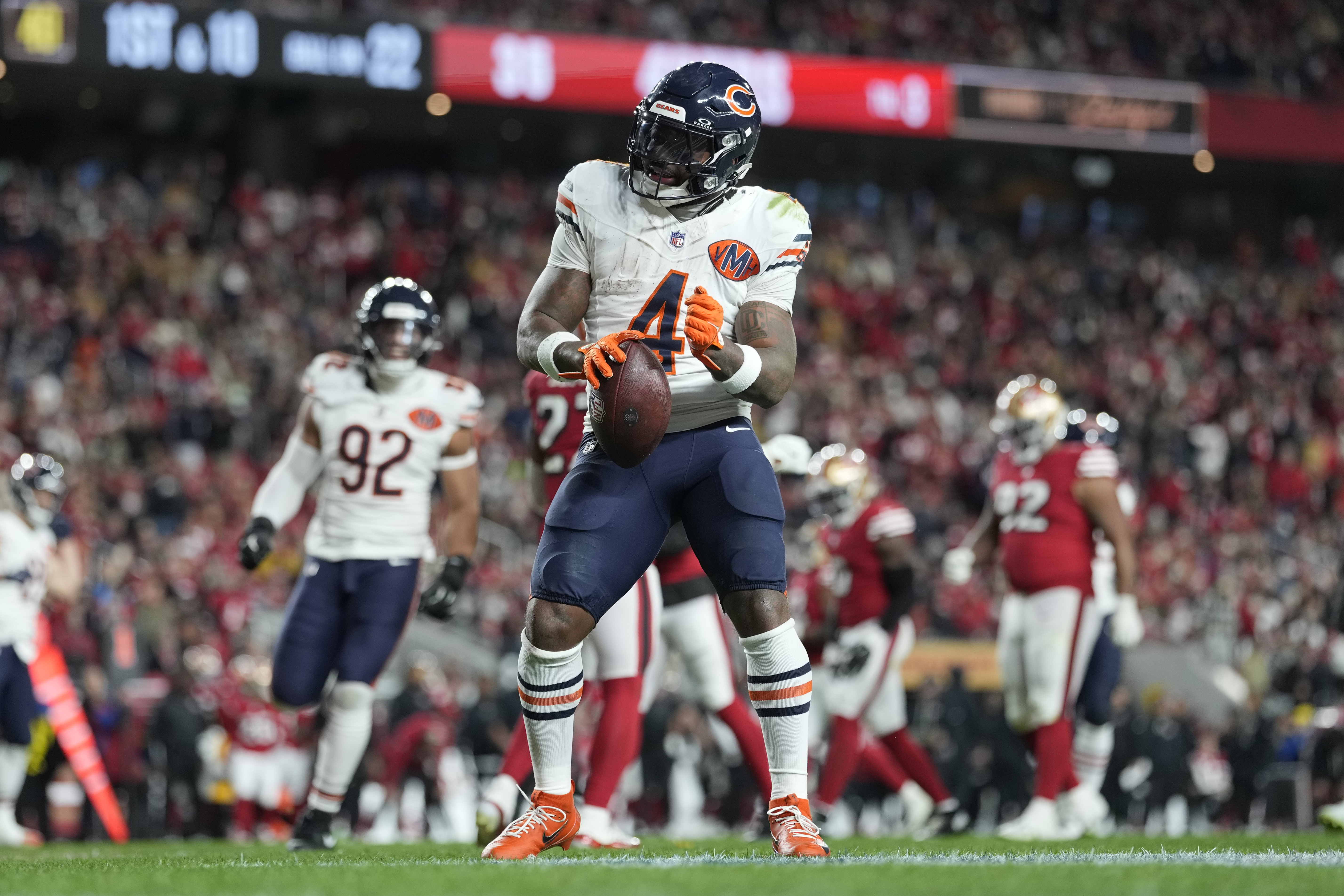 Chicago Bears running back D'Andre Swift - who's featured in my anytime touchdown predictions for the divisional round - celebrates after scoring a touchdown.