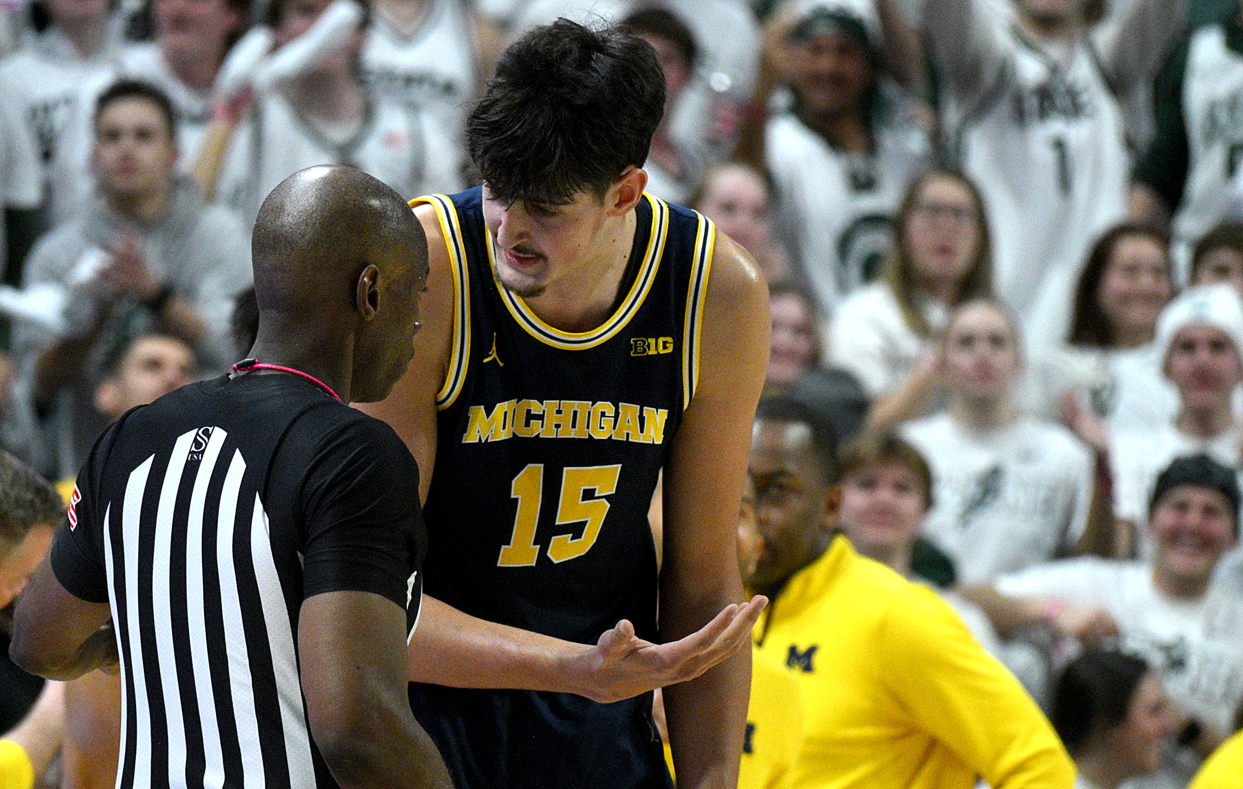  Michigan Wolverines center Aday Mara (15) argues a foul call as we break down our College Basketball Play of the Day.