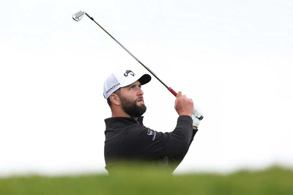 Jon Rahm of Spain plays her shot from the third tee during the final round of the Farmers Insurance Open on the South Course of Torrey Pines Golf Course on January 28, 2023 in La Jolla, California. Photo by Sean M. Haffey/Getty Images via AFP.